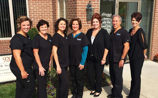 Dentist Miamisburg OH John R. Striebel With Team HP Dentist John R. Striebel With Team Outside